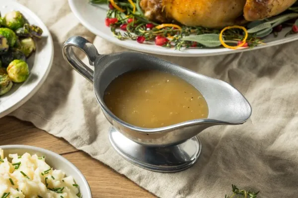 Savory turkey gravy with fresh herbs for the best dishes for your thanksgiving dinner celebration this year in city mountains