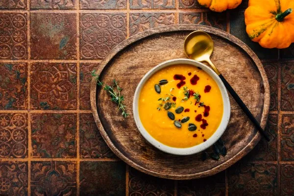 Velvety pumpkin soup with sage crème fraîche for the best dishes for your thanksgiving dinner celebration this year in city!.